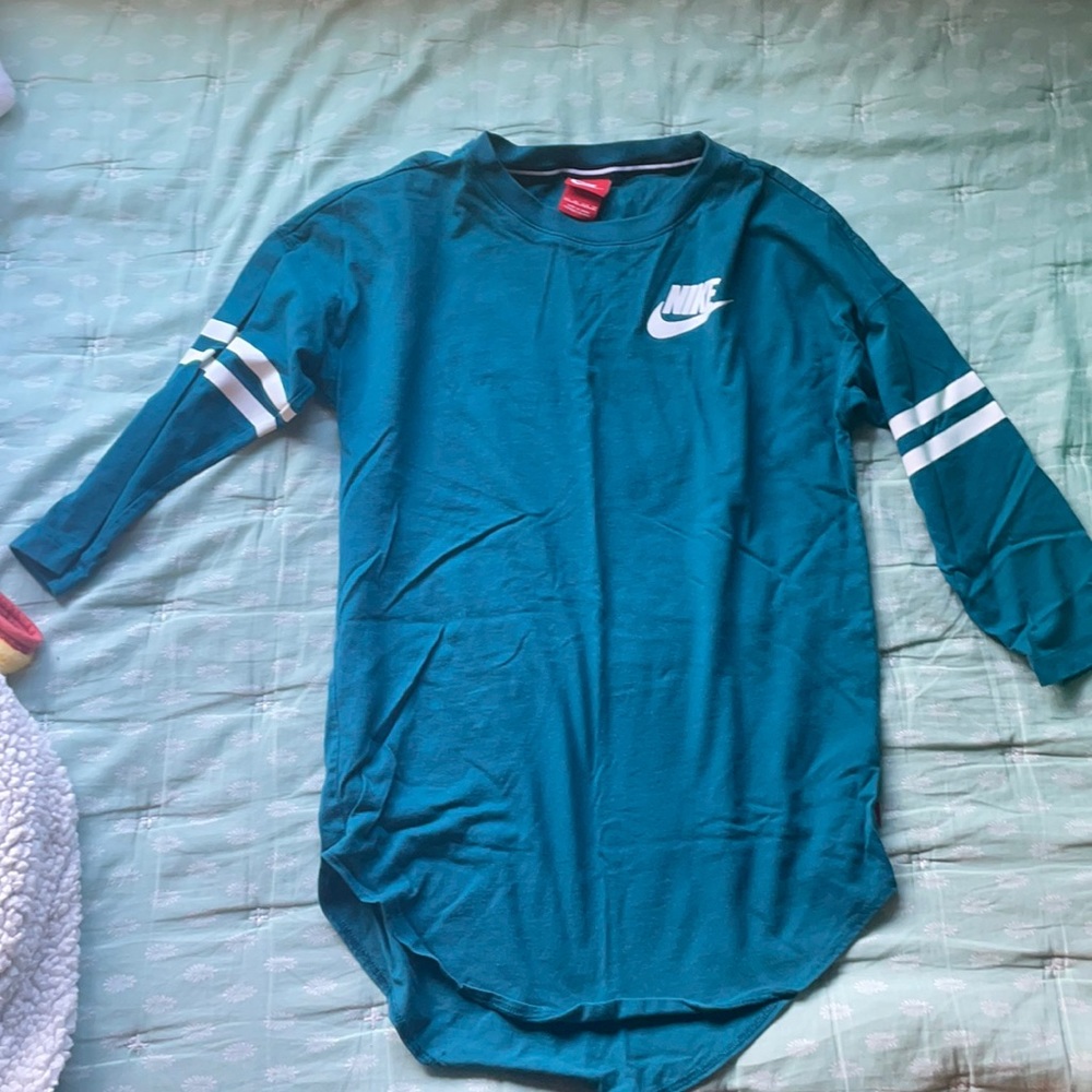 Nike xsmall . Like new quarter sleeve turquoise shirt